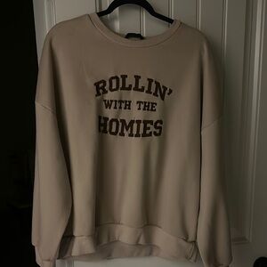 Cream Sweatshirt with Brown Text